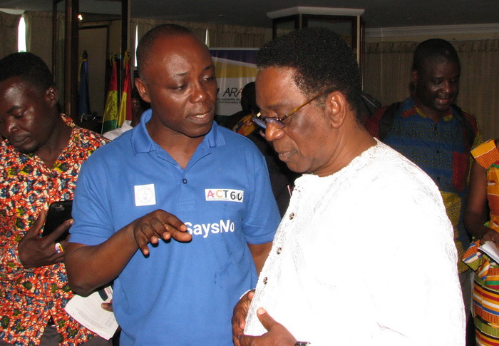 Rev. Dr Emmanuel Ansah ( 2nd left), Board Member of the Ghana Conference on Religion for Peace, interacting with Prof. Kwesi Yankah (right), Minister of State in charge of Tertiary Education, after the Anti-Corruption Conference held in Accra.